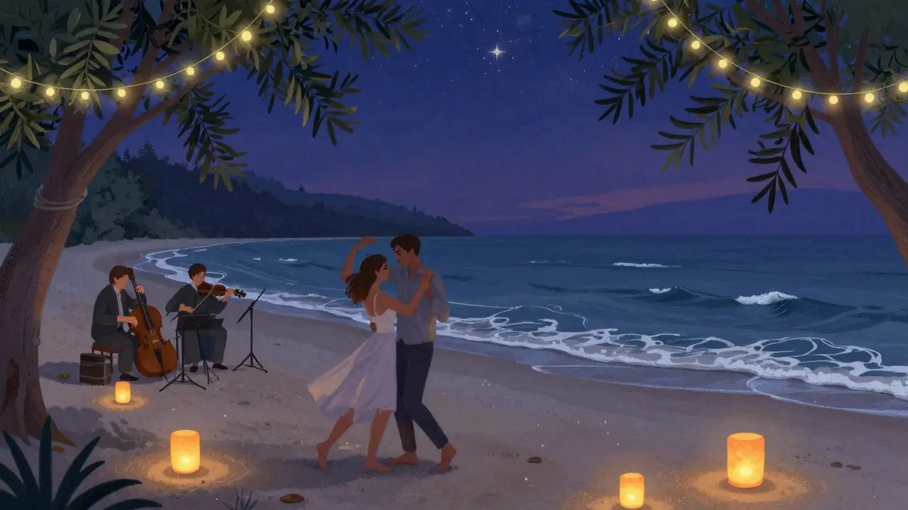 A couple dances barefoot on a moonlit beach with lanterns and a string quartet playing nearby.